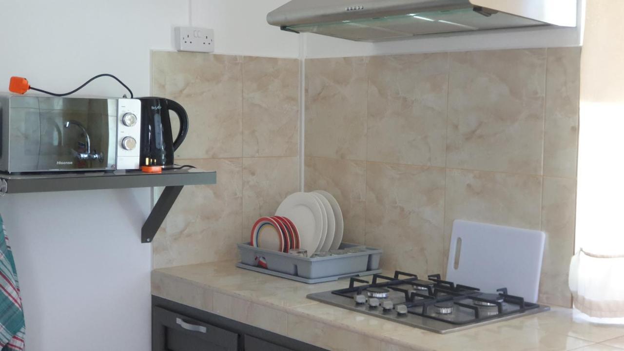 Chez Johnny Apartment Grand Baie Bagian luar foto